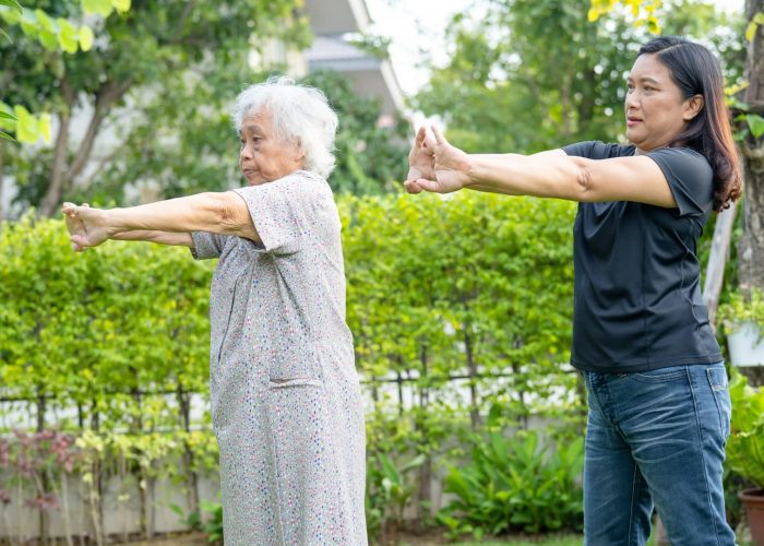 Heritage Haven Homes_About Page_Young Lady Doing Yago With Older Lady Heritage Haven Homes_About Page_Young Lady Doing Yago With Older Lady